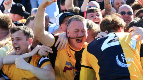 Newport County fans celebrate