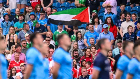 A Palestine flag is displayed during the GAA Football All-Ireland Senior Championship preliminary quarter-final match between Dublin and Cork at Croke Park in Dublin