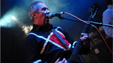 Getty Images Pete Shelley performs at Nozstock