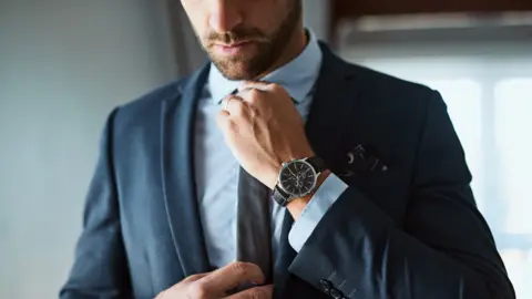 Getty Images Man in suit and tie