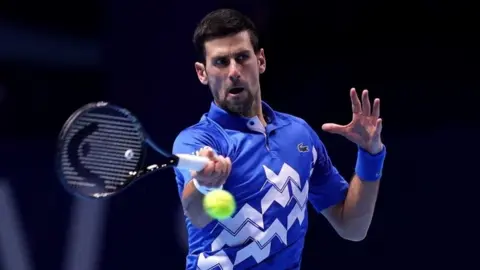 PA Media Novak Djokovic at a game in London