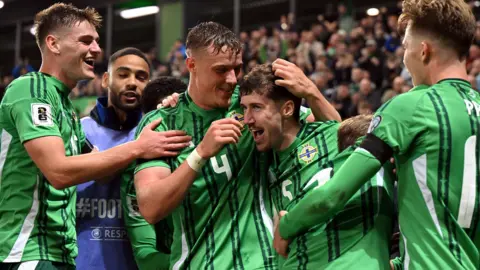 Northern Ireland celebrate Trai Hume's goal