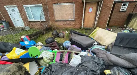 Local Democracy Reporting Service Waste left outside a property 