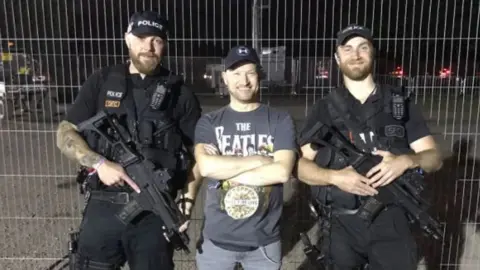 Retro Man with two armed officers