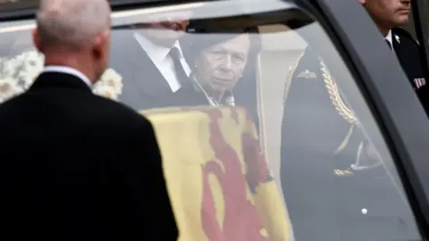 Reuters The Princess Royal, observing her late mother's coffin