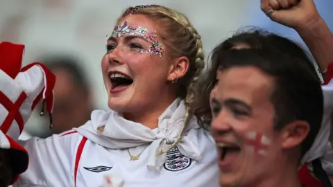 Getty Images England fans cheering during a World Cup match