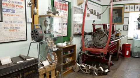 A horse-drawn fire engine inside Tempsford Museum & Archives