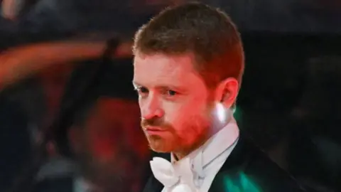 Reuters Former Downing Street chief of staff Morgan McSweeney. A headshot of him arriving at a banquet in a white bow tie and black suit jacket.