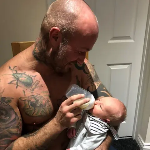 Family handout Paul Dawson with son Ben