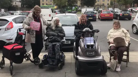 A Place to Sit Sit-in at Bramley Shopping Centre
