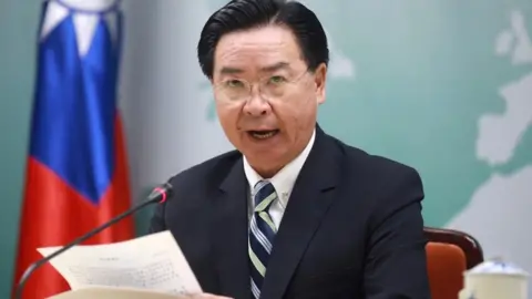 Reuters Taiwan Foreign Minister Joseph Wu speaks at a news conference announcing Taiwan's decision to terminate diplomatic ties with the Pacific island nation of Kiribati, in Taipei, Taiwan 20 September 2019