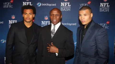 PA Media Sebastian Eubank, left, pictured with his father, Chris Eubank, and brother Chris Eubank Junior.