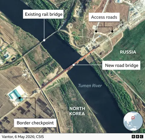 An annotated satellite image taken on 6 May showing the new road bridge, the existing rail bridge, two access roads and a border checkpoint