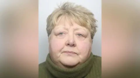 West Yorkshire Police A woman wearing a green pullover