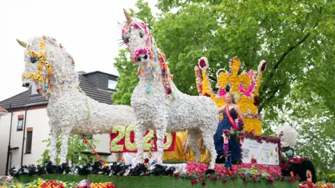 PA Media A float at the Spalding Flower Parade 2023