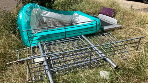 James Grant/BBC Rubbish in blackthorn