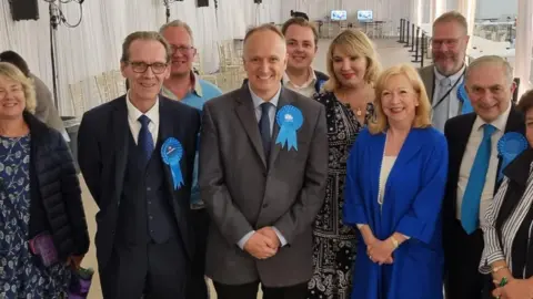 David Jackman/BBC Neil Hudson with the Conservatives in Epping Forest