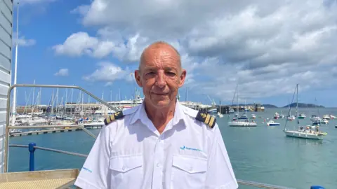 BBC Guernsey Ports marina manager Steve Lowe standing in front of a marina