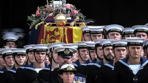 Reuters Close up of sailors and the Queen's coffin