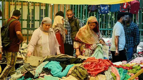 Both India and Pakistan have ceased hostilities since they announced the ceasefire but say they remain vigilant. A scene from a Srinagar market in Indian-administered Kashmir. 