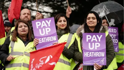 PA Media Striking Heathrow workers