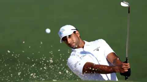 EPA/Shutterstock Aaron Rai of England hits from a bunker on Hole 2 in Round 2 of the 2026 Masters tournament in August, Georgia, USA, 10 April 2026.
Golf 2026 Masters Tournament - Round 2, Augusta, USA - 10 Apr 2026