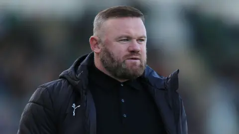 Plymouth Argyle boss Wayne Rooney on the touchline