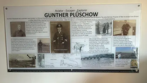 Lester Banks/Three Daws A display featuring photos and information of a German soldier.