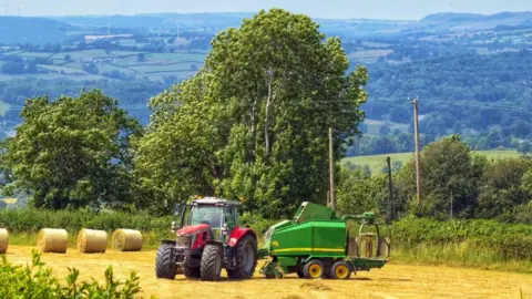 Ruth Davies / BBC Weather Watchers A tractor is seen in a field