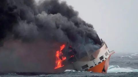 AFP A handout picture released by the French Marine Nationale shows flames on the Italian merchant ship Grande America