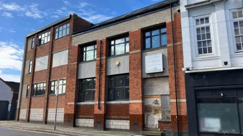 Oadby & Wigston Borough Council A street view image of the old Admiral factory in Wigston