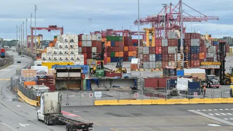 AFP via Getty Images Shipping containers at the Port of Montreal