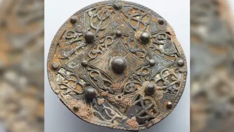 Somerset Museums Service Cheddar Brooch before conservation