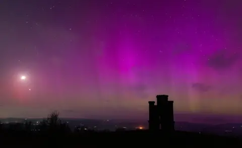 TBowphotography/Twitter Northern Lights at Paxtons Tower, Carmarthenshire