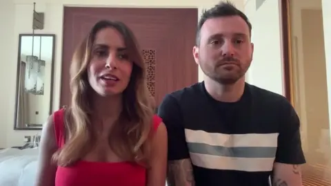 Layla Hamood and Matthew McGinn speak to BBC Breakfast from their hotel room in Dubai.