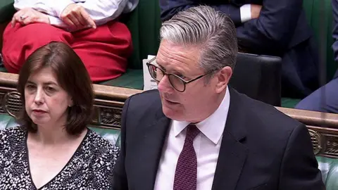 Sir Keir Starmer at prime minister's questions next to Commons leader Lucy Powell