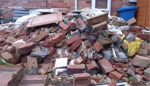 The Insolvency Service Bricks and debris piled up