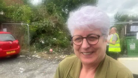 Francesca Estasy pictured in front of the site of the garages