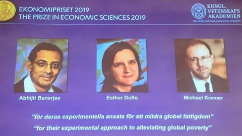 AFP/Getty Abhijit Banerjee, Esther Duflo and Michael Kremer