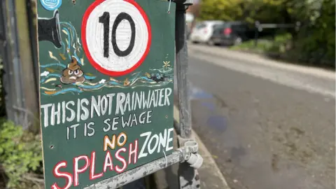 BBC Another sign produced by protesters