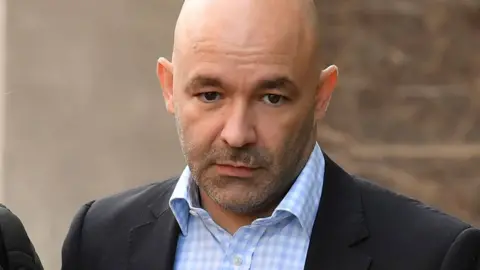Marcio Gomes arriving for the opening day of the Grenfell Tower inquiry in 2018