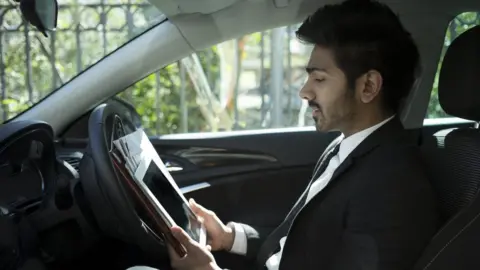 Getty Images Waiting in the car