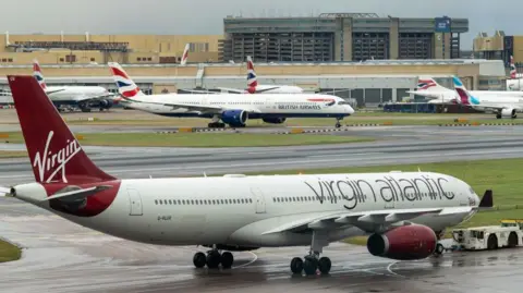 Getty Images A passenger aircraft, operated by Virgin Atlantic Airways at Heathrow Airport Terminal 4, in London, UK, on Tuesday 28 January 2025