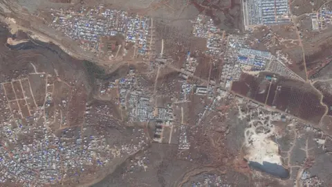 DigitalGlobe Satellite images from 2 December 2019 showing a camp for displaced people in northern Idlib province, Syria