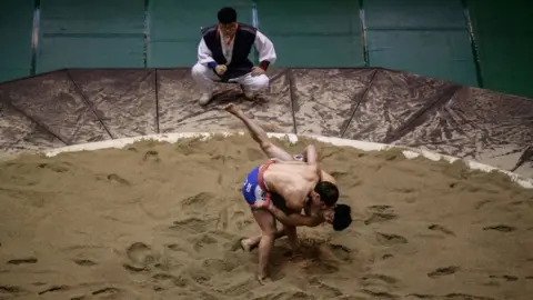 AFP/Getty Korean wrestlers