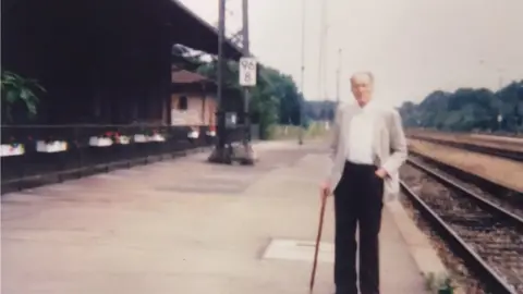 Frank Tuck family Frank Tuck in 1989 next to a German railway line