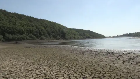 PA Media Low water levels at the Lindley Wood Reservoir near Otley, West Yorkshire.