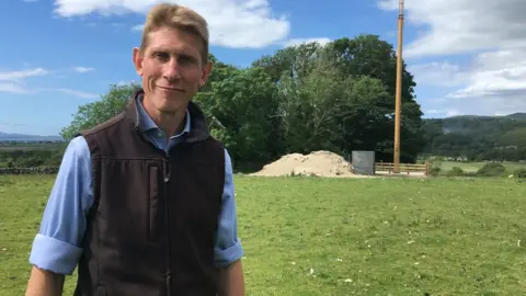 Ed Bailey - a farmer and chartered surveyor from Llanbedr near Harlech - has been affected by the rent reduction