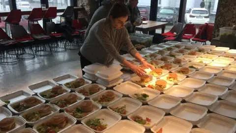 Ruslan Buriak Preparing food packages