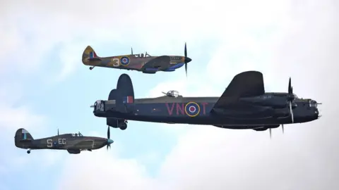 PA Media Hurricane, Spitfire and Lancaster from the Battle of Britain Memorial Flight